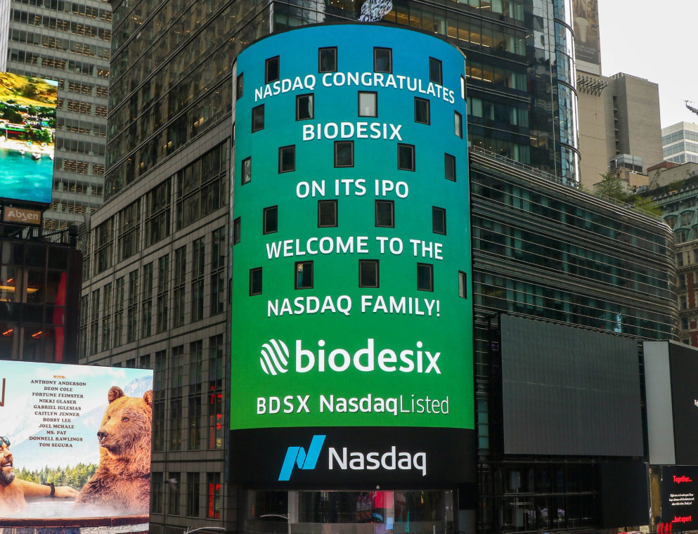 Sign on building celebrating BDSX becoming Nasdaq listed